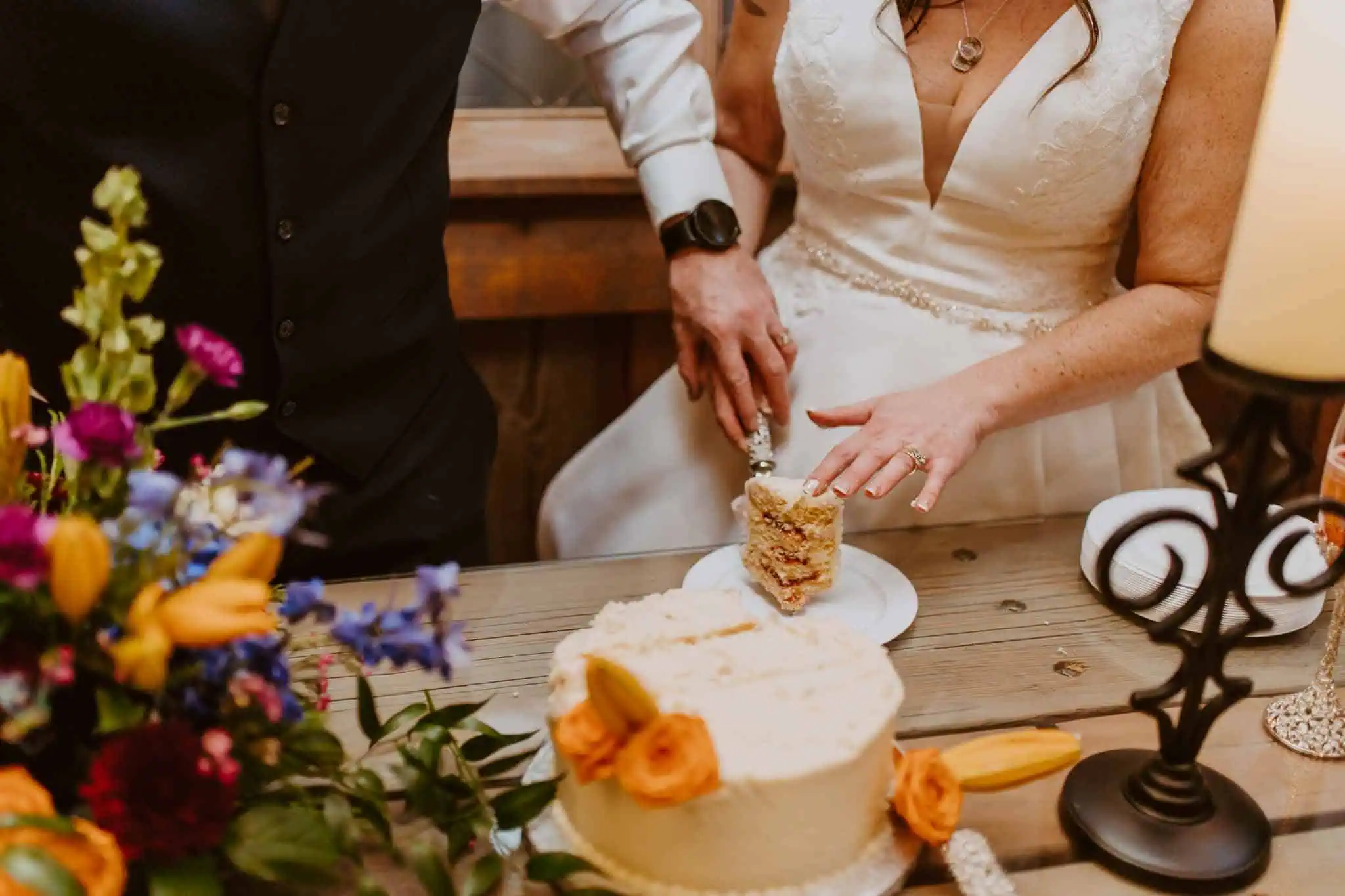 bride and groom cake cutting