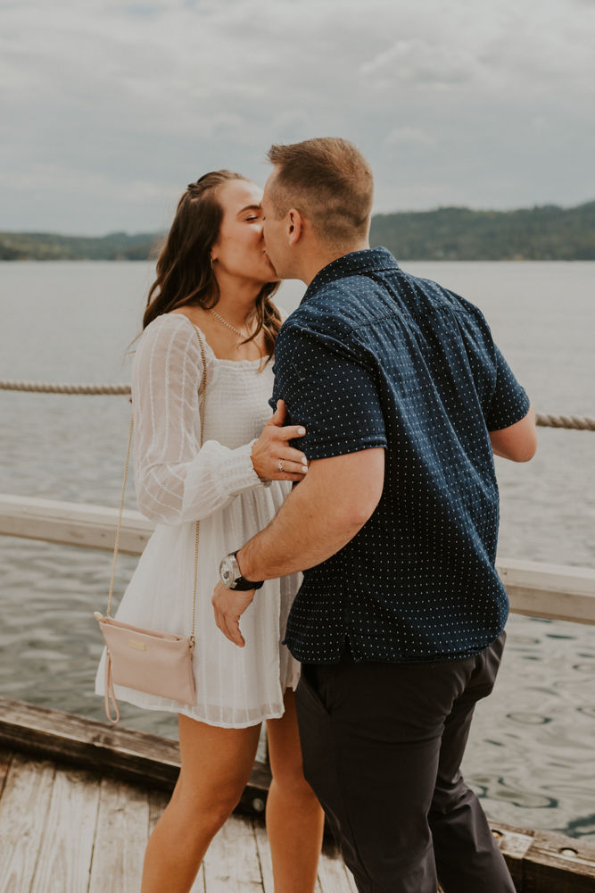 surprise proposal on the coeur d'alene resort boardwalk in north idaho, karlie larson photography