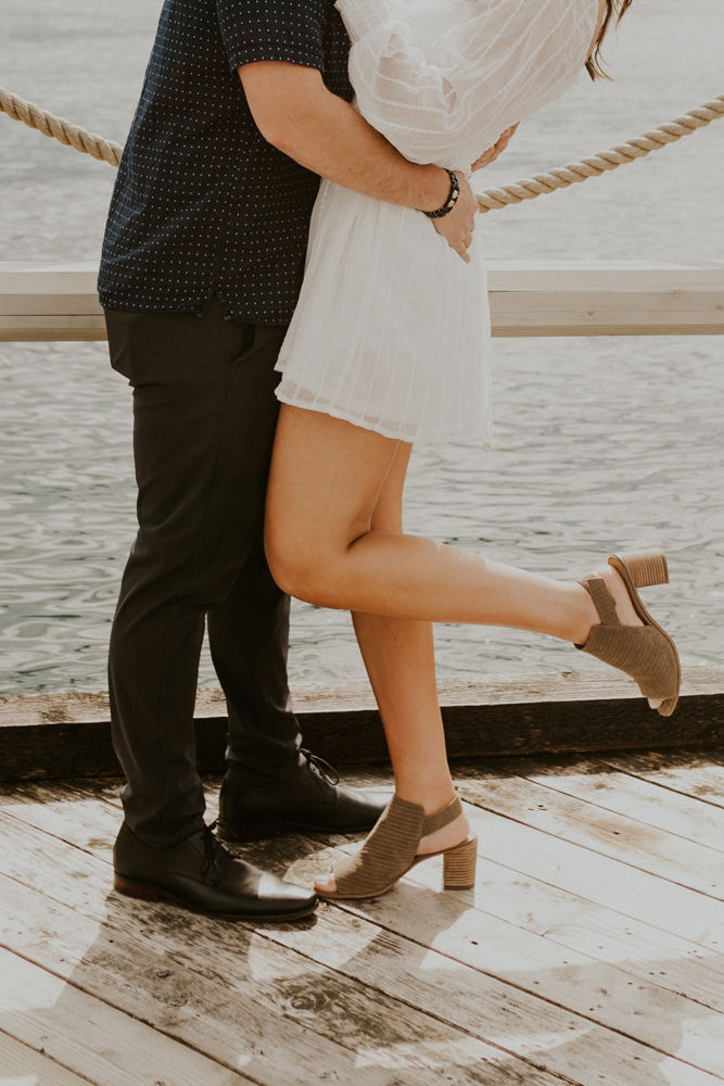 surprise proposal on the coeur d'alene resort boardwalk in north idaho, karlie larson photography
