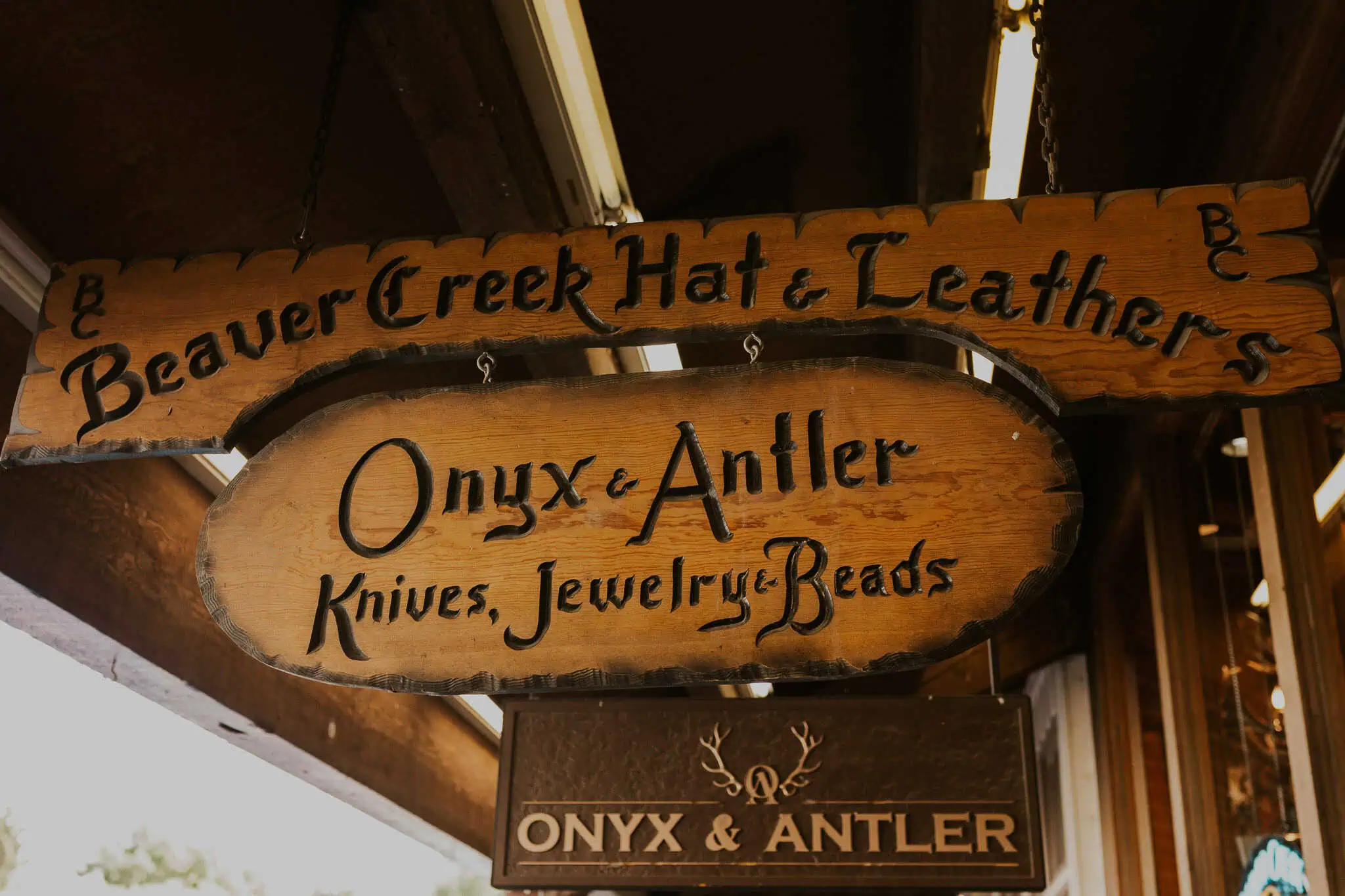 beaver creek hat and leather sign downtown jackson hole