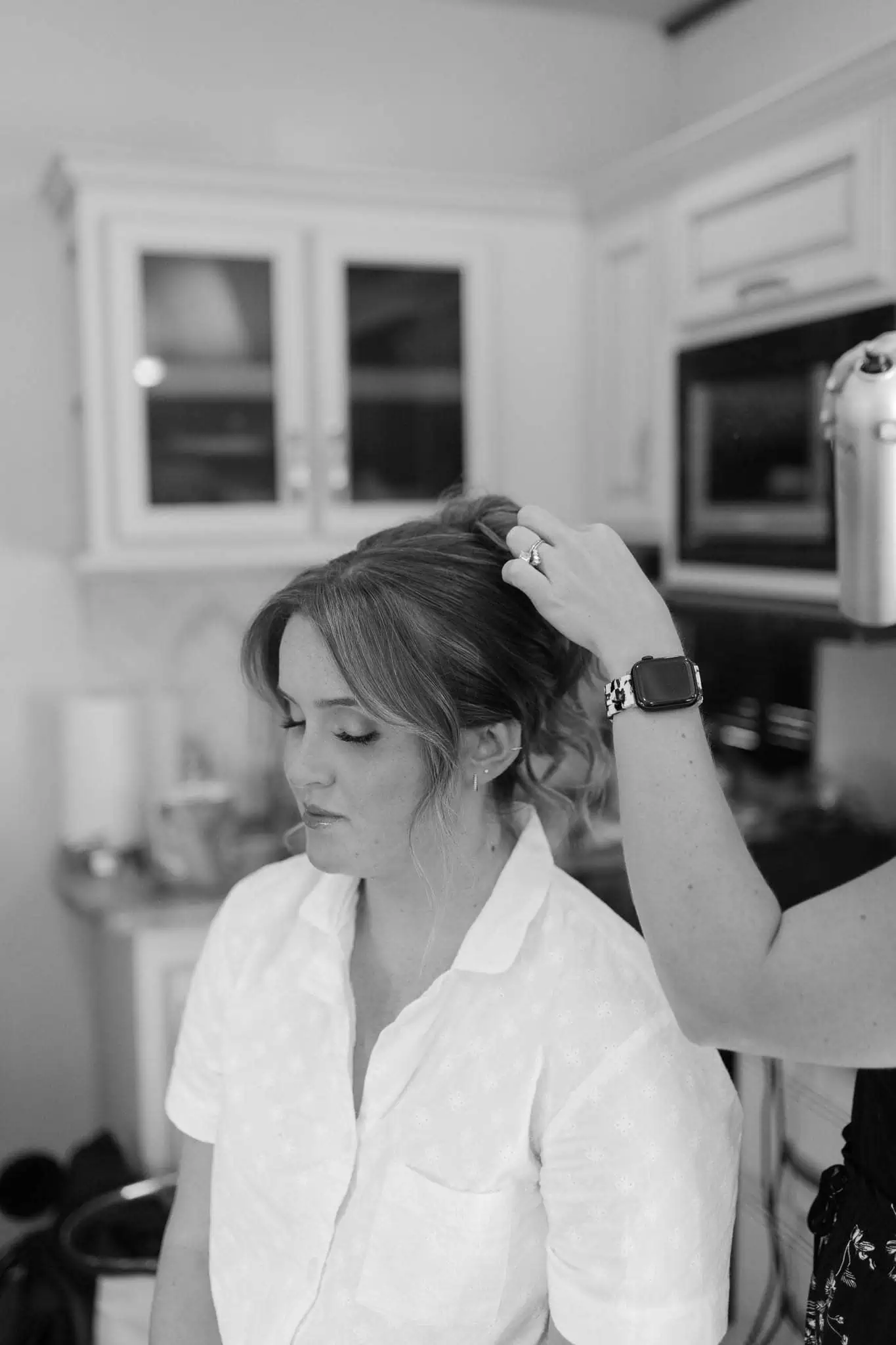 bride getting hair done