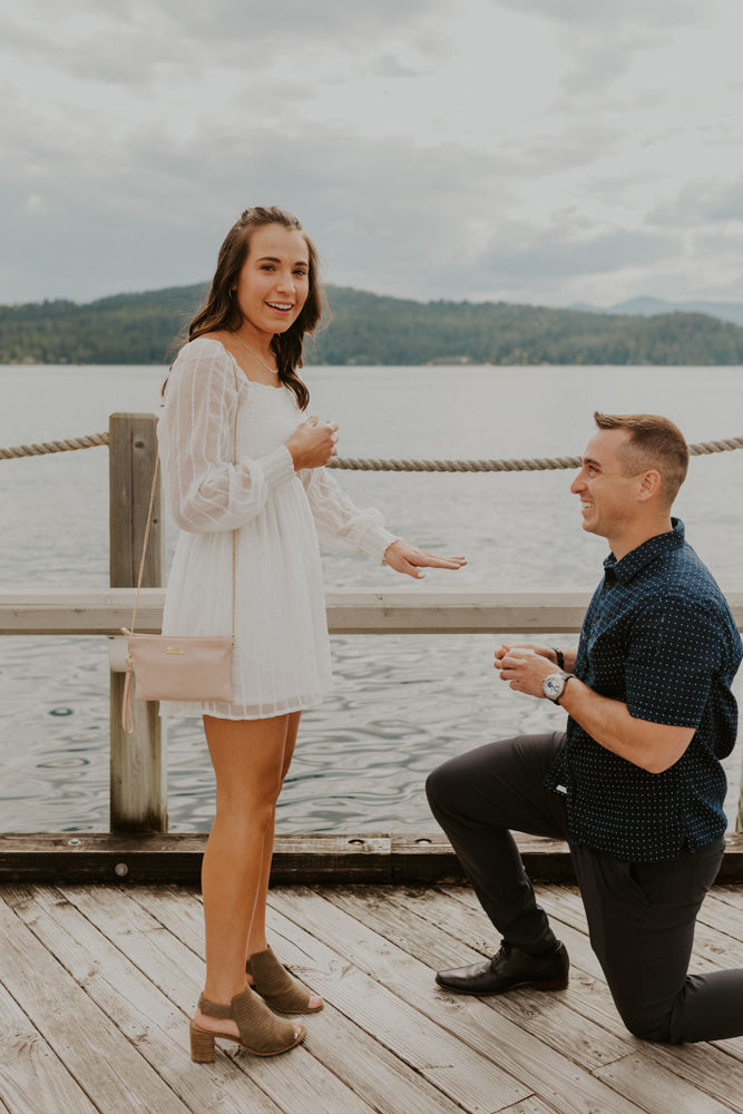 surprise proposal on the coeur d'alene resort boardwalk in north idaho, karlie larson photography