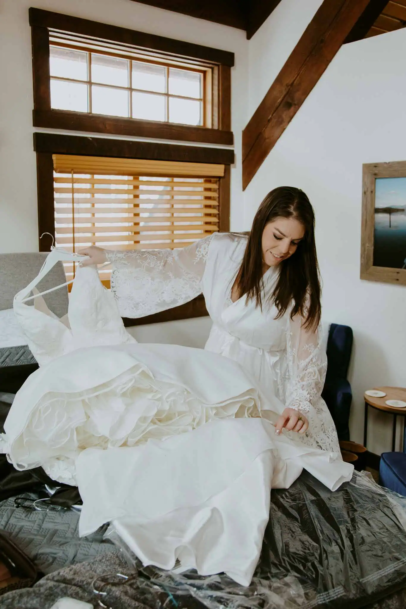 a bride holding her wedding dress