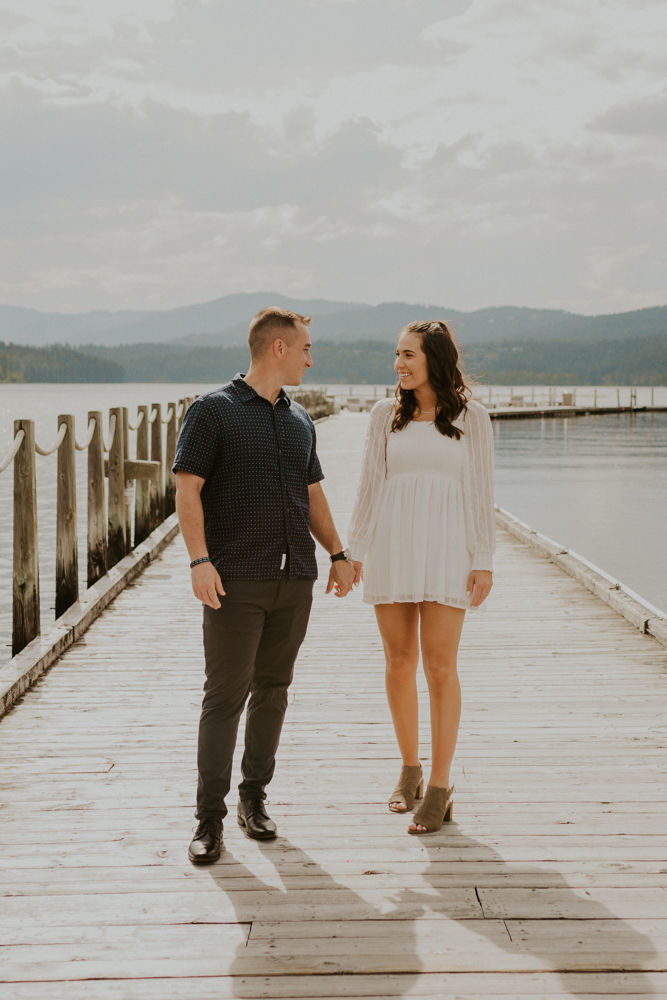 surprise proposal on the coeur d'alene resort boardwalk in north idaho, karlie larson photography