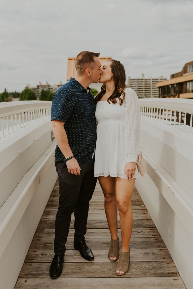 surprise proposal on the coeur d'alene resort boardwalk in north idaho, karlie larson photography