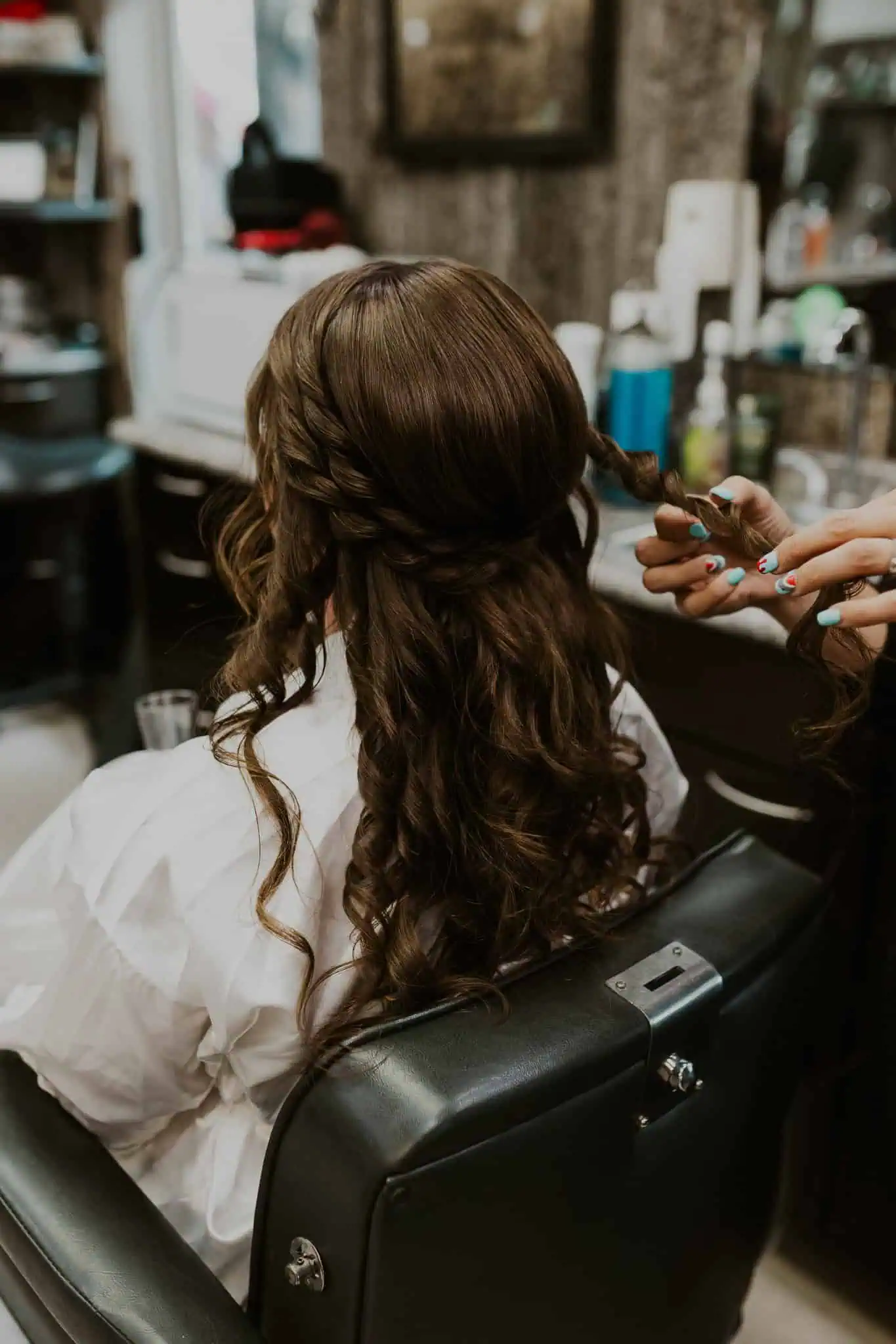 a bride getting her hair done