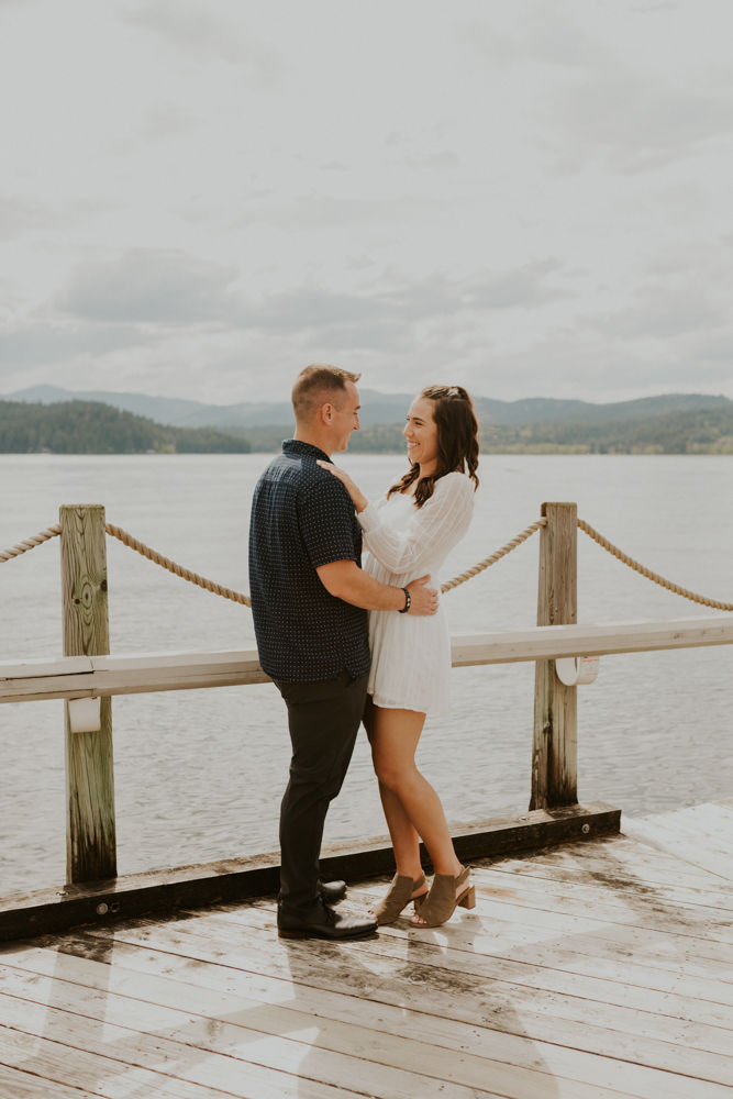 surprise proposal on the coeur d'alene resort boardwalk in north idaho, karlie larson photography