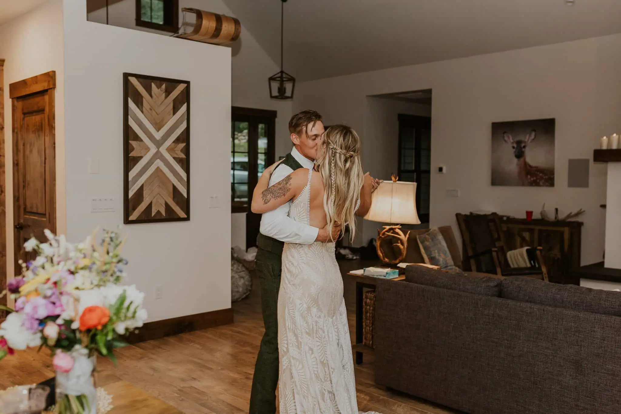bride and groom kissing while dancing