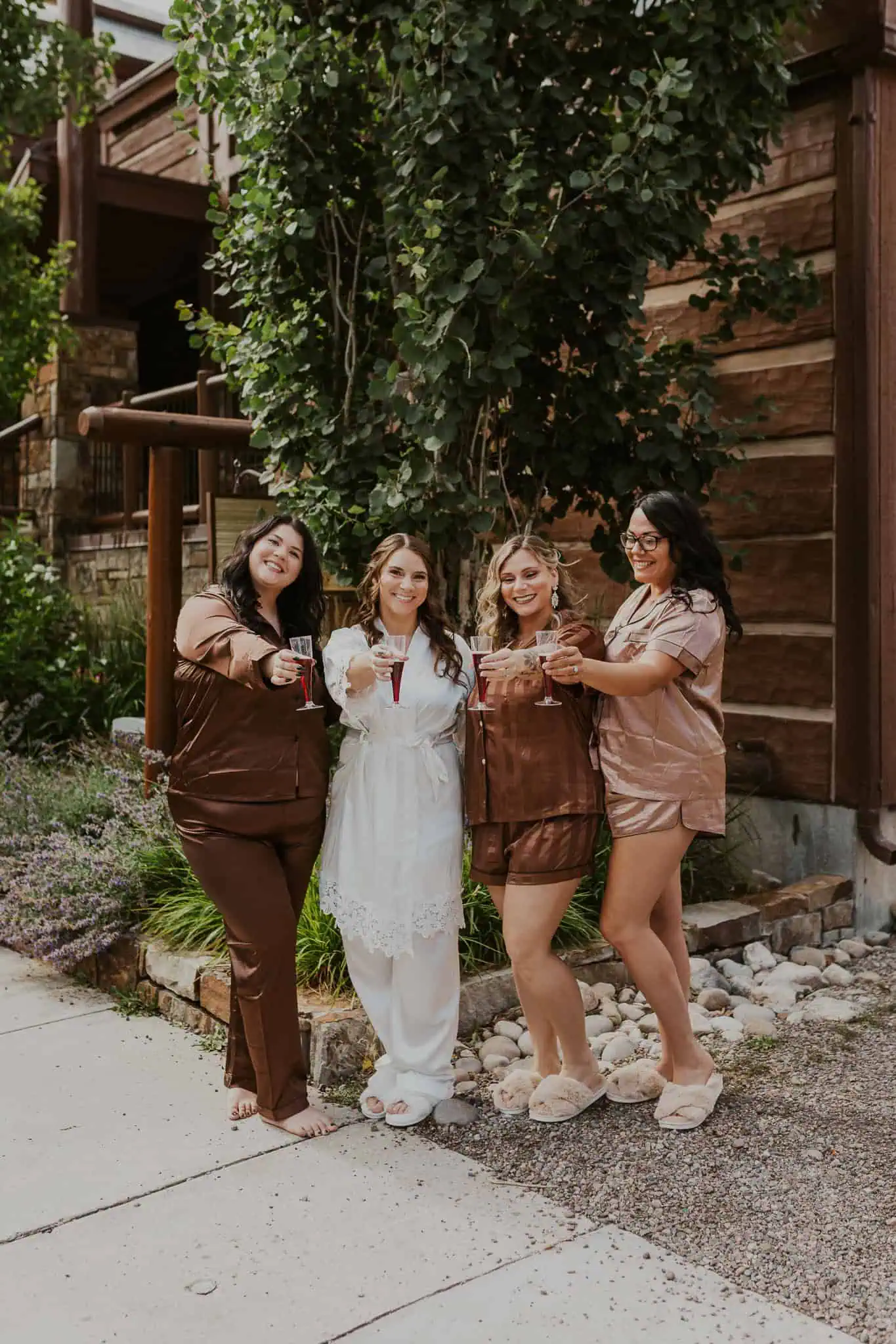 bridesmaids in matching brown pajamas