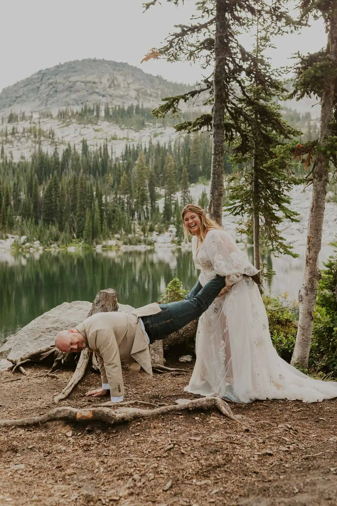 bride and groom doing the wheelbarrow