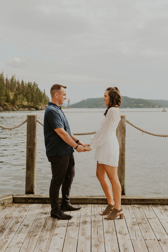 surprise proposal on the coeur d'alene resort boardwalk in north idaho, karlie larson photography