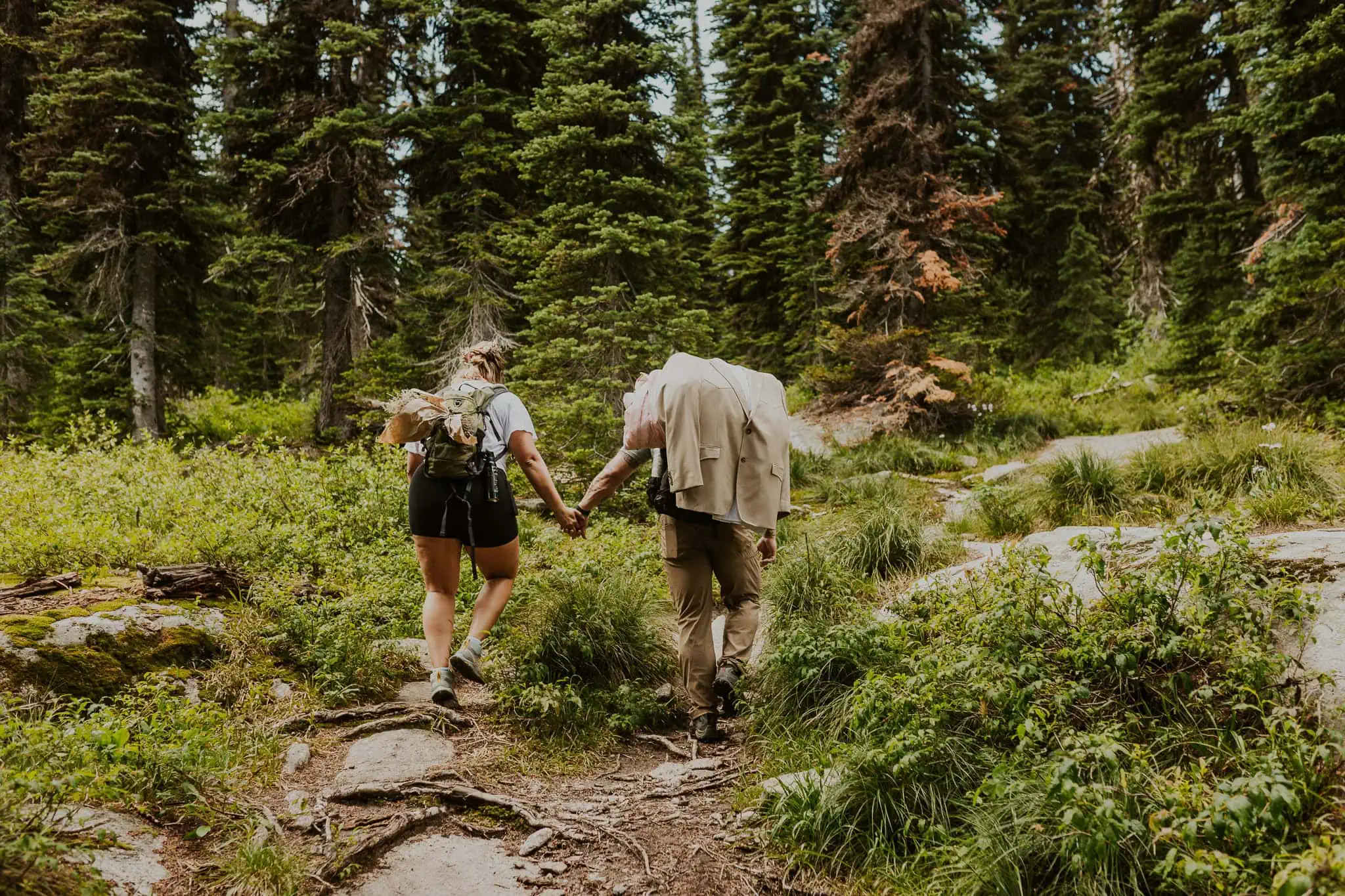 a couple hiking in the forest