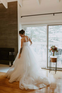 a bride playing with her dress tulle