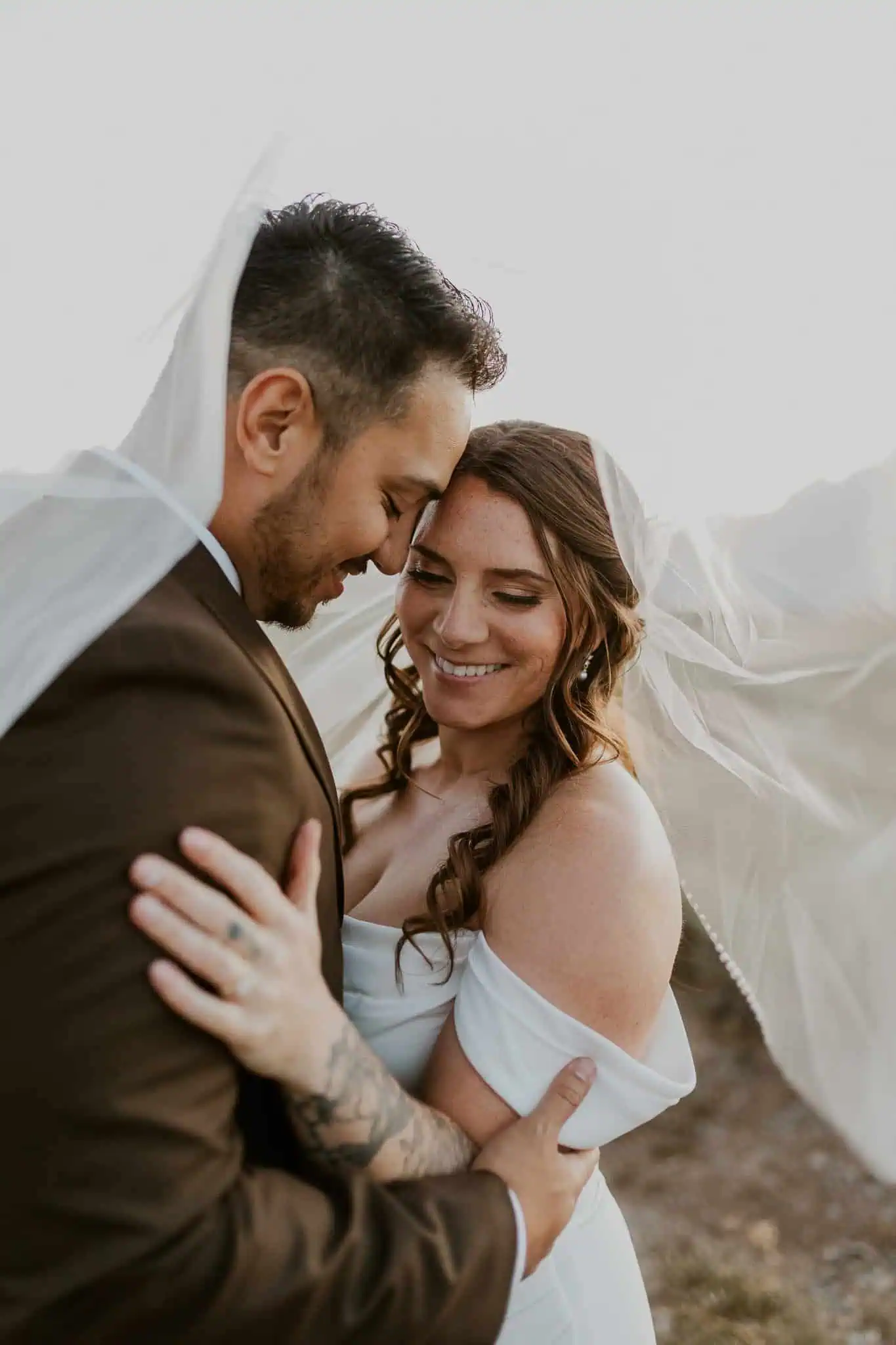 bridal portraits in the tetons under a bride's veil