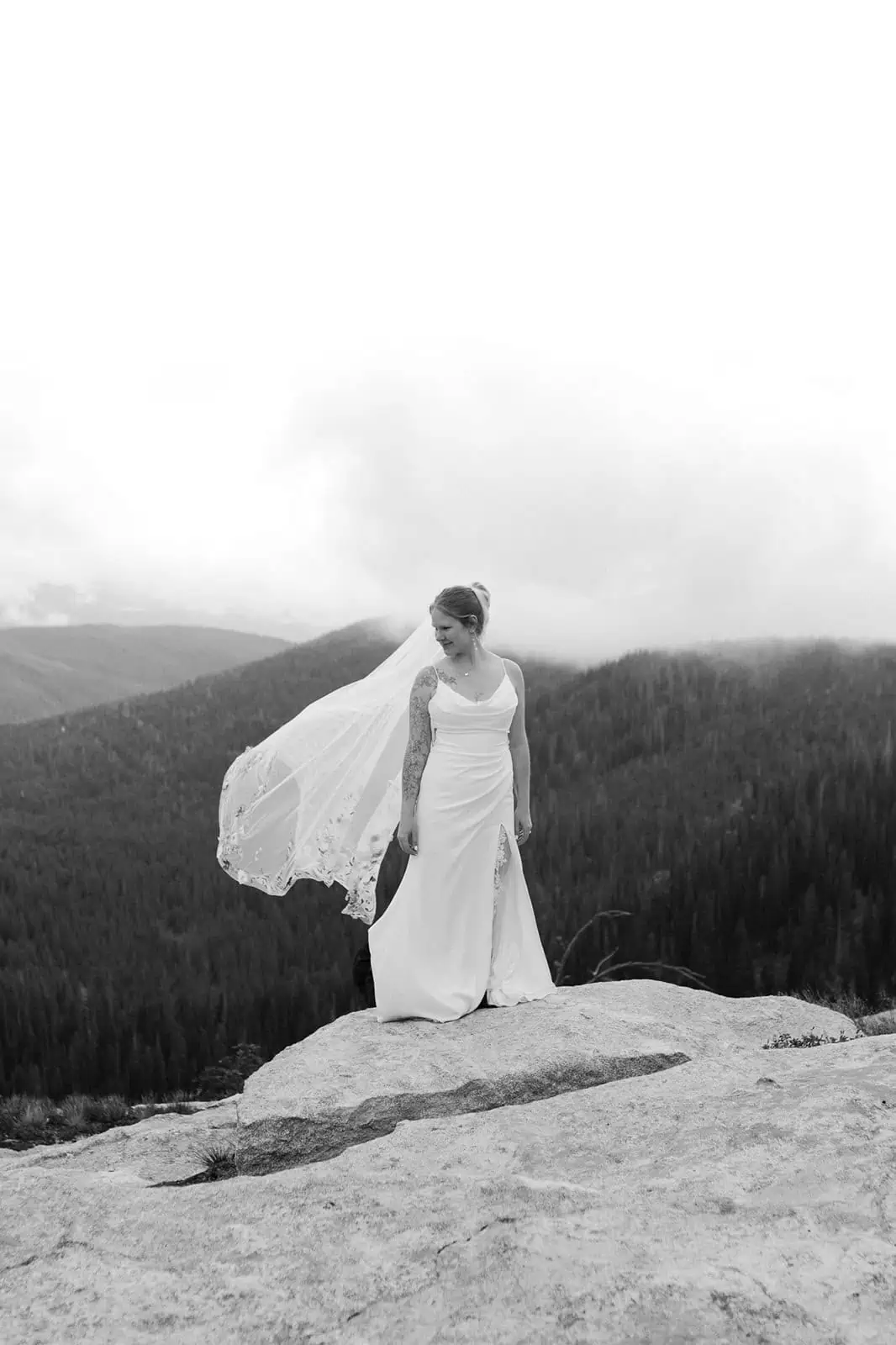 bride with long veil blowing in the wind