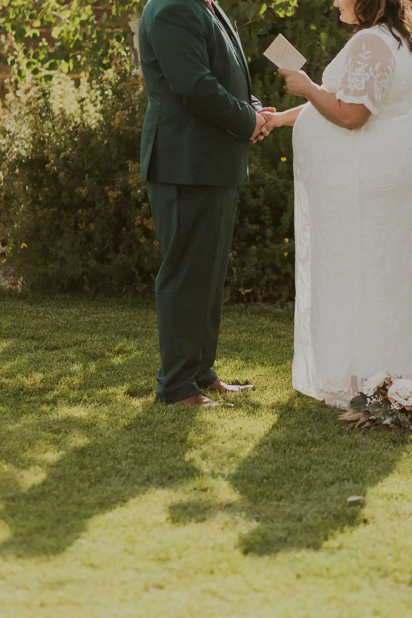 a couple reading vows to each other