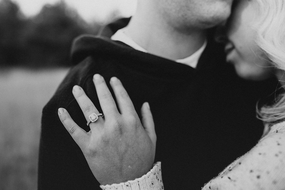 engagement session in north idaho with mountains, fields, and lake