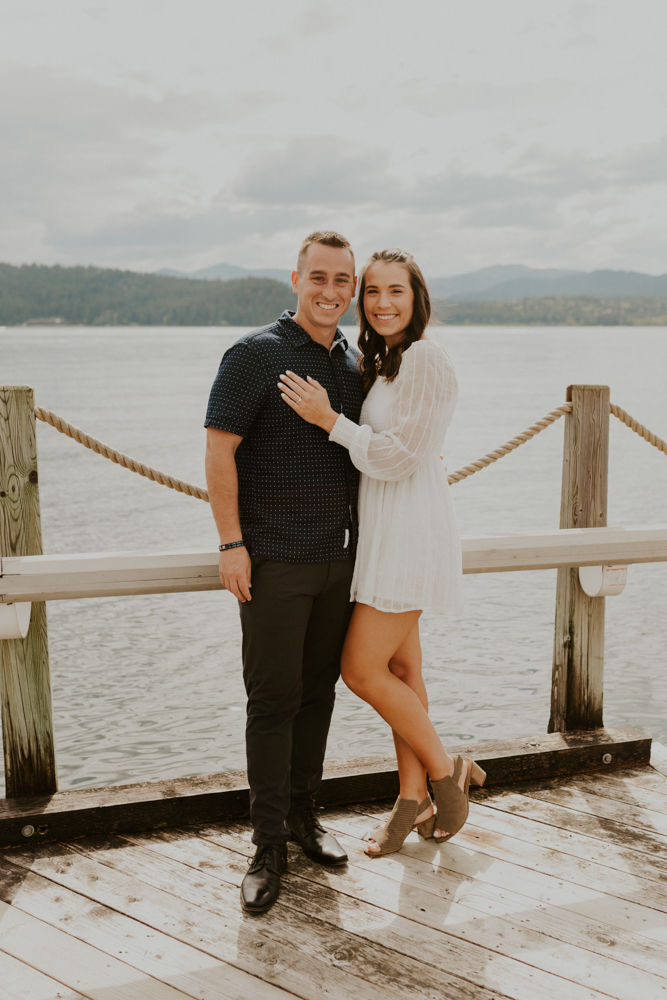 surprise proposal on the coeur d'alene resort boardwalk in north idaho, karlie larson photography