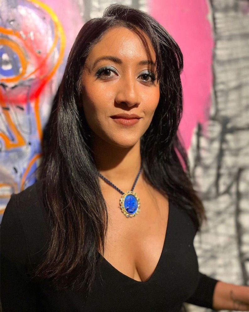 Priya Darshini wearing Mejia Jewelry's Venetian glass cameo necklace