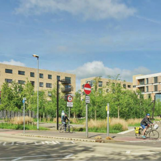 people cycling in an urban setting