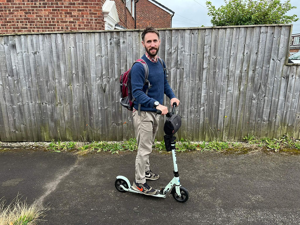 man on scooter