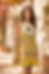 Woman in a yellow floral dress from a b2b apparel sourcing agency
