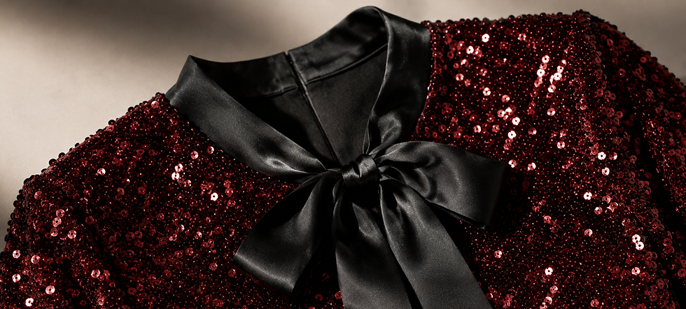 Premium burgundy sequin blouse with a black satin bow.