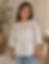 Girl in embroidered white blouse from kidswear collection