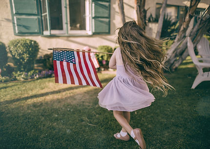 Girl Waving US Flag