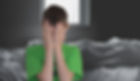 boy covering face