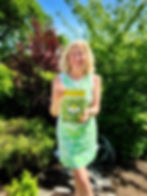 Janice Cox with the 2025 Herb of the Year Book on Chamomile