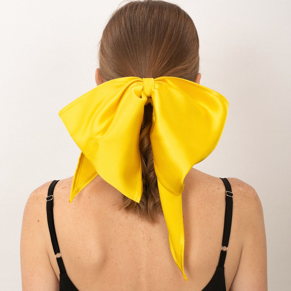 Жовтий бант з сатину на гумці