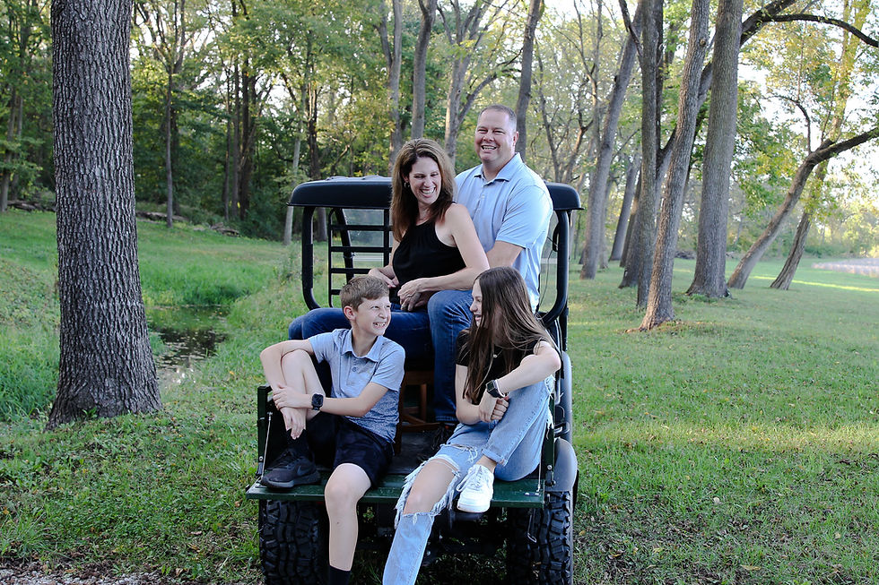 Amanda Cryer and her family in the woods
