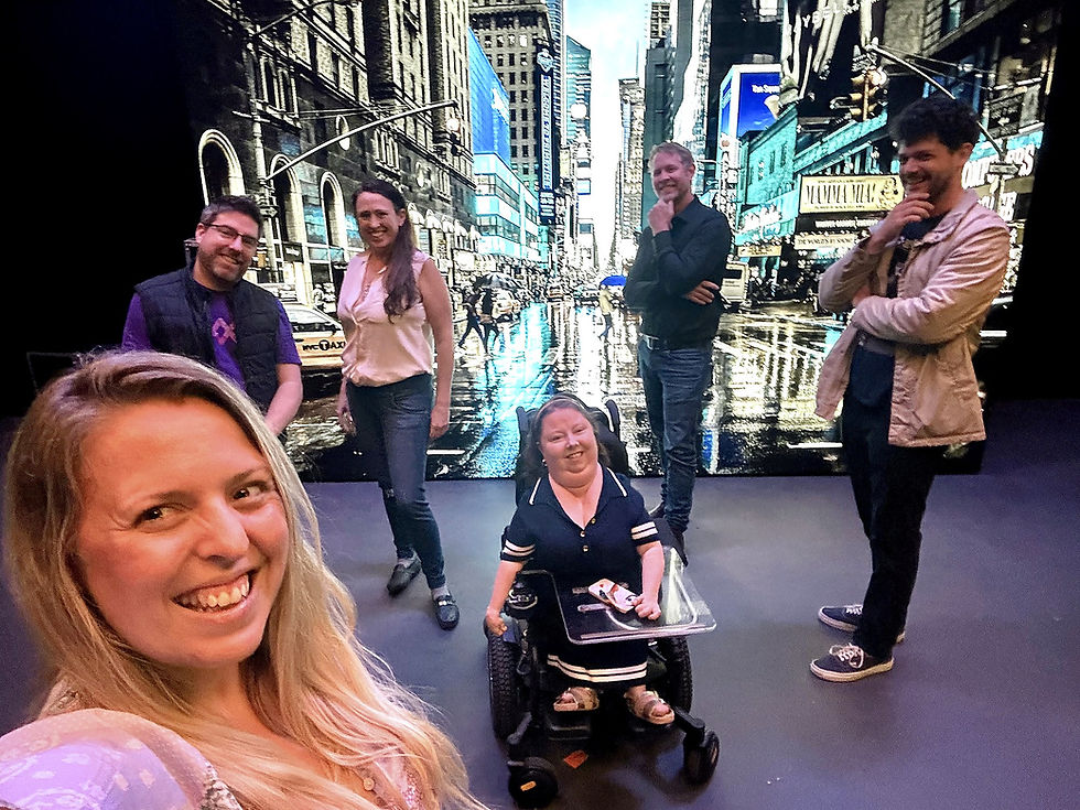 Visitors on the LED volume at Chrysaor Studios with a New York street environment
