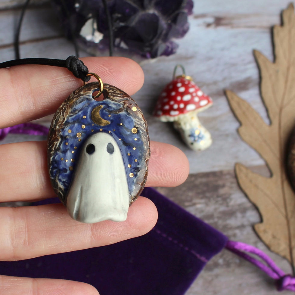 Thumbnail: Moon Ghost handmade ceramic necklace in purple velvet pouch