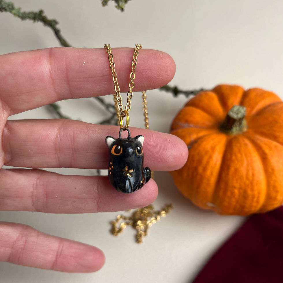 Thumbnail: Big eyed Black Cat with Star handmade ceramic necklace
