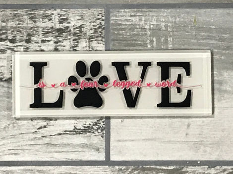 This is a great tile with a pop of color through it... symbolizing there three legged family!