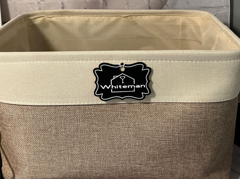 Completing this basket with a personalized tag..