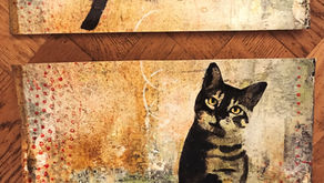 Katze mit Vogel