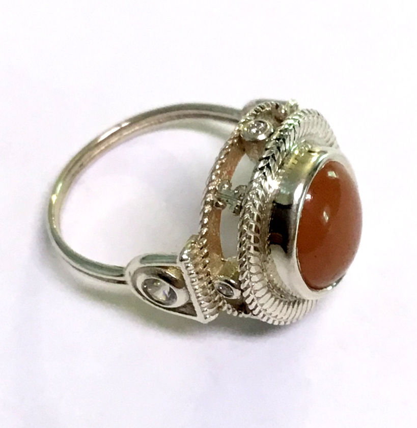 Thumbnail: Diamond and sapphire silver ring with center gem