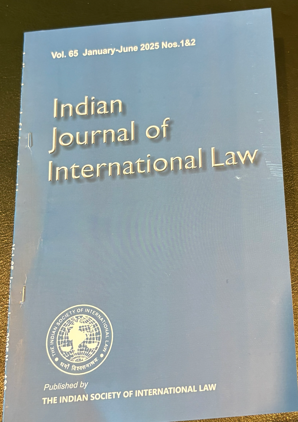 Blue cover of Indian Journal of International Law, Vol. 65, Jan-June 2025, with society logo. Published by The Indian Society of International Law.