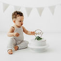 un bébé et un gâteau pour une séance photo anniversaire près d'Orléans