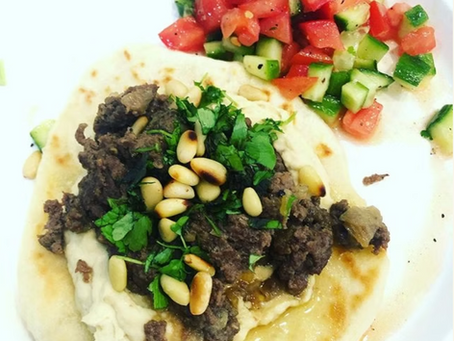 Hummus Topped with Ground Beef and Flat Bread
