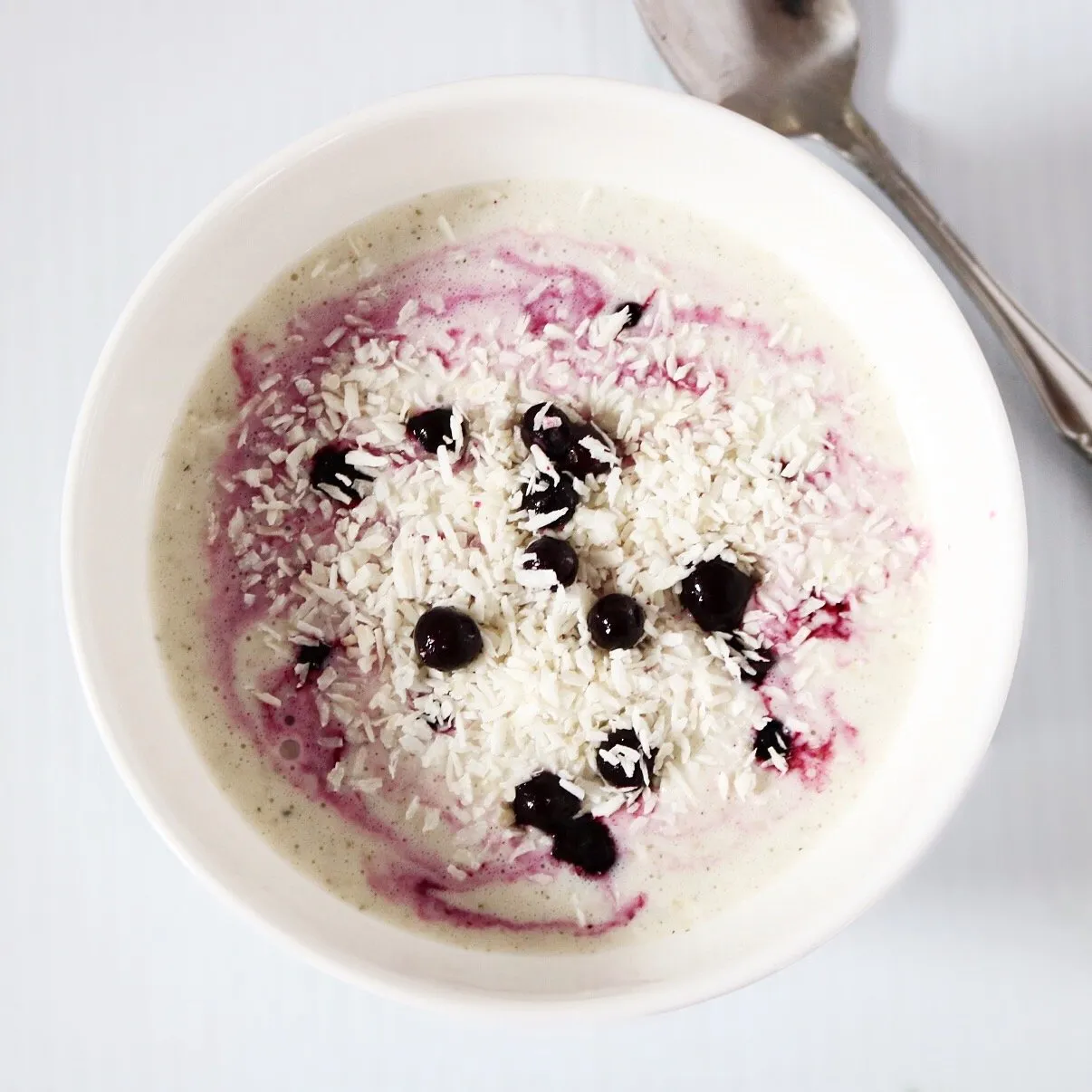 Hemp yogurt in a bowl with blueberry