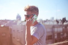 Guy Holding a Phone