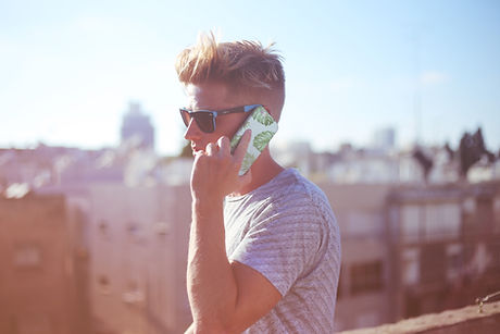Guy Holding a Phone