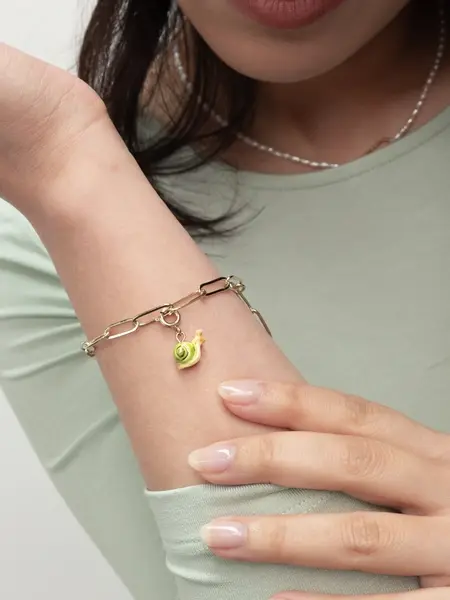 Miniature : Bracelet doré orné du charm Escargot Nach en porcelaine