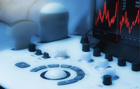 An ultrasound machine and abdominal ultrasound and echocardiography probes