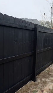 Close-up of black semi-gloss fence finish in Fairburn, GA — smooth, even look
