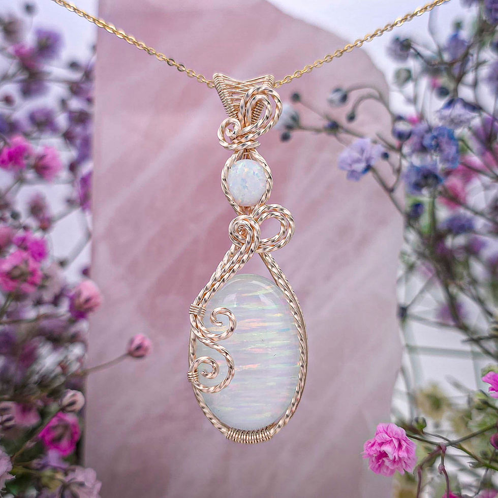 Thumbnail: Lab Grown White Opal Pendant in a Twisted, Woven, and Swirly 14k Gold Frame
